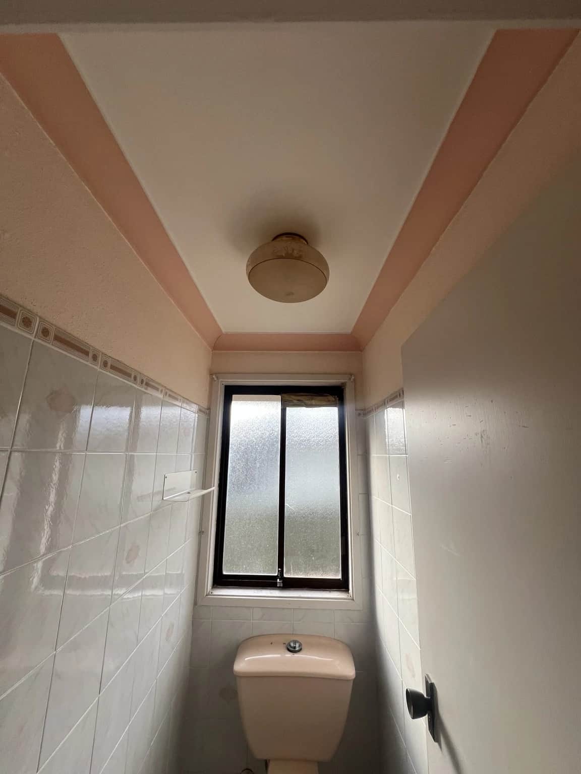 Toilet before ceiling replacement and repainting in Baulkham Hills home