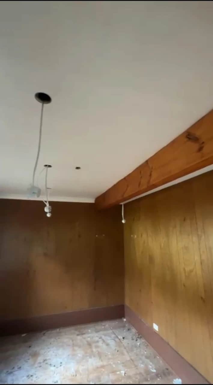 Timber-lined room before interior restoration and painting in Baulkham Hills