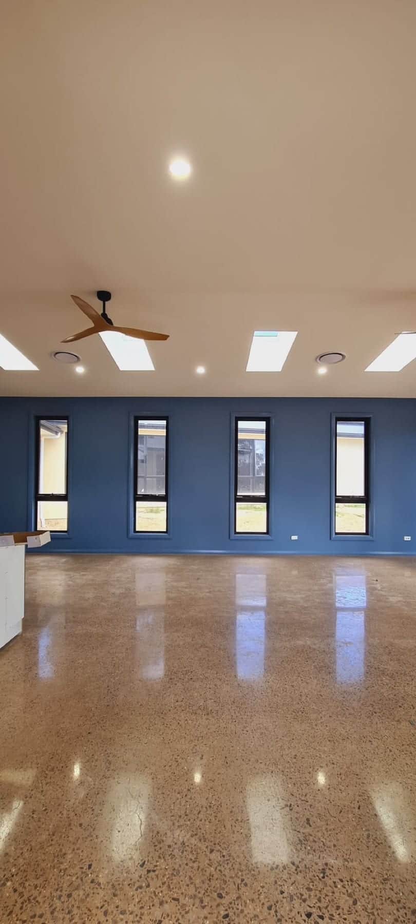 Navy feature wall and joinery, Glenorie new-build living space