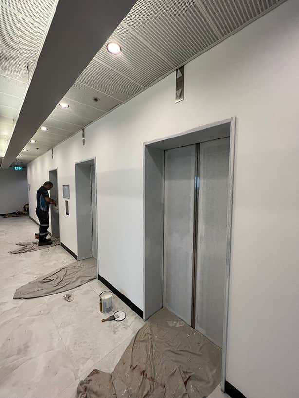 Smooth durable lift door finish completed in Chatswood Sydney