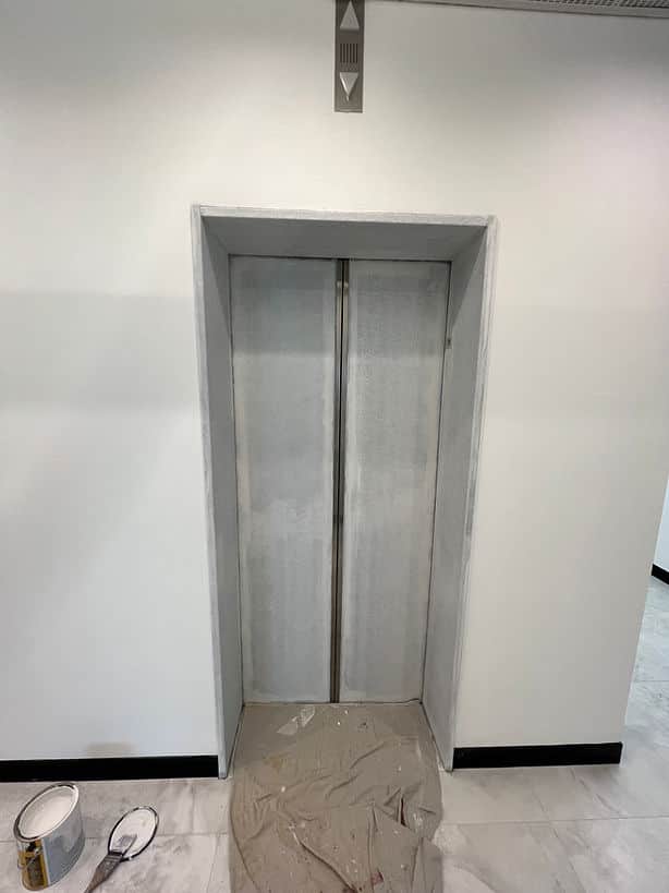 Commercial lift door repaint in Chatswood NSW