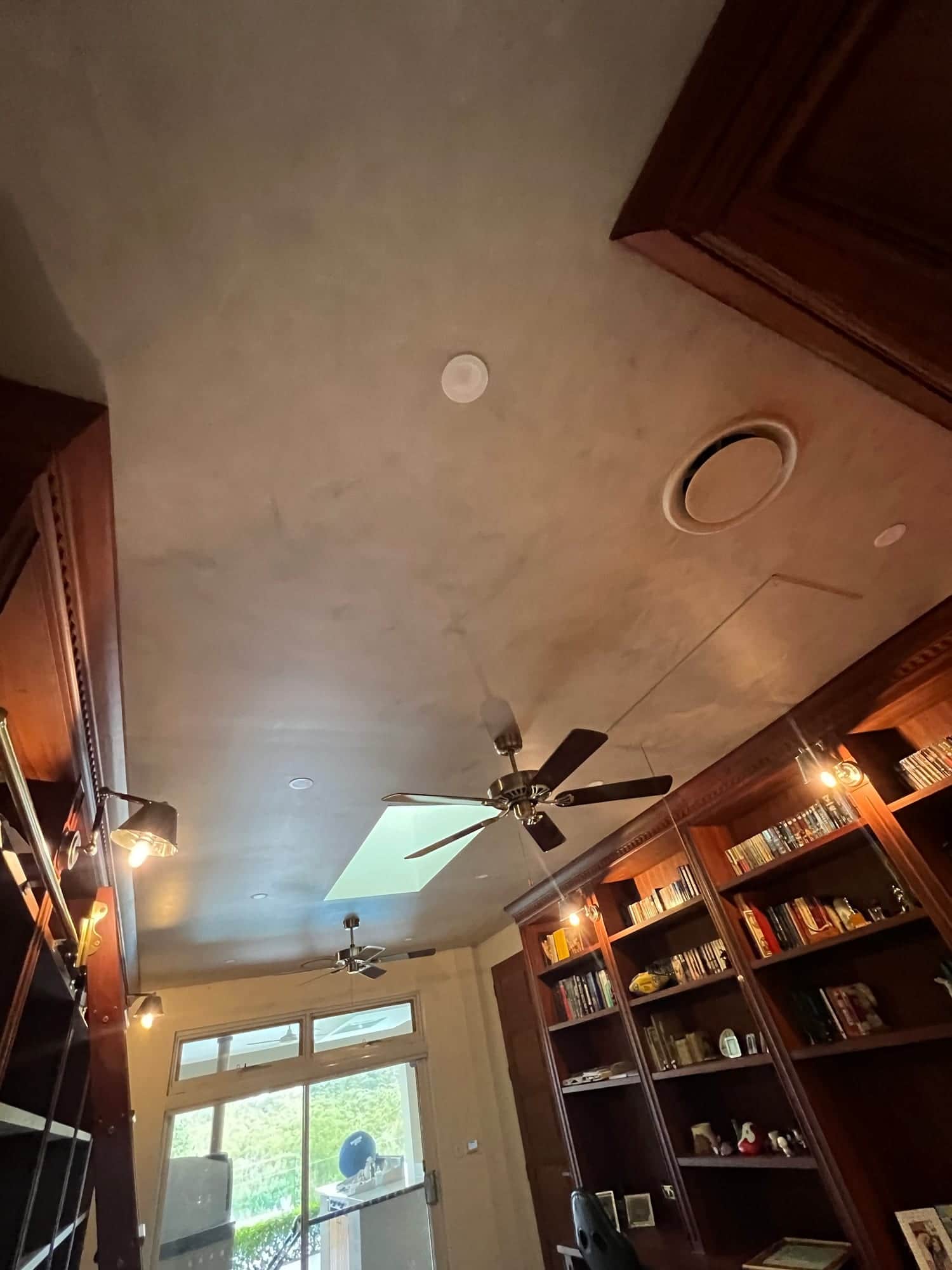 Porter's French Wash being hand-applied to the library ceiling, Dural