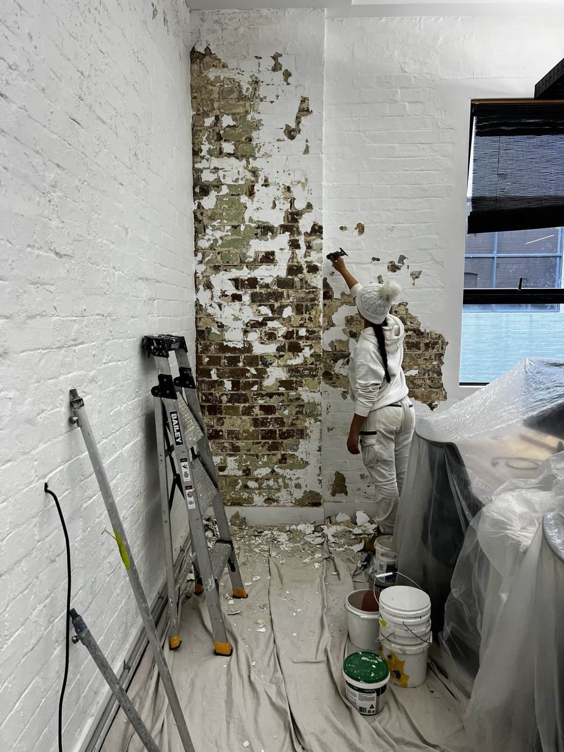 Close-up of freshly painted textured brick wall in Chippendale commercial office